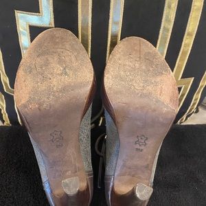 Tory Burch sexy heel booties.